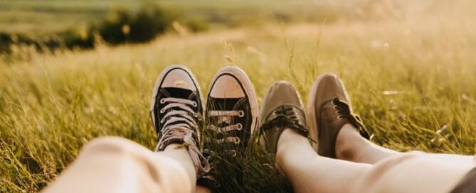Feet in grassy field