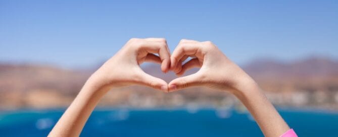Hands making the shape of a heart